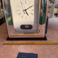 orologio a pendolo in argento