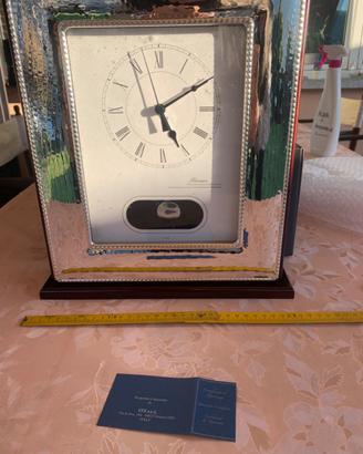 orologio a pendolo in argento