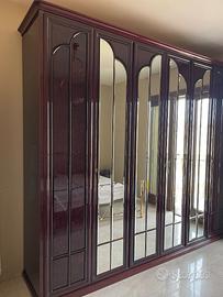 Camera da letto in legno mogano