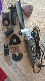 utensile  oscillante con tubo aspirapolvere 