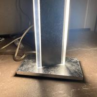 Coppia di lumetti moderni in foglia d'argento