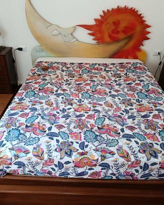 Letto matrimoniale e comodini