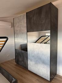 Armadio a due ante scorrevoli con specchio