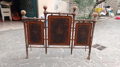 Letto in ferro decorato