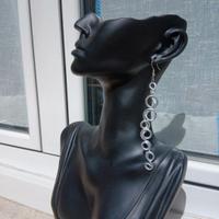 orecchini metallo colore argento cascata di cerchi