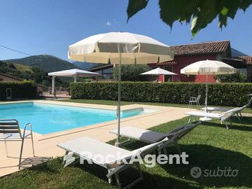 VILLA IN PIETRA CON GIARDINO PRIVATO E PISCINA