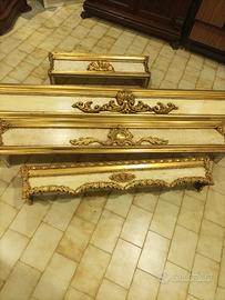 Mantovane in legno intagliato e dorato 