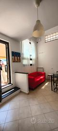 Openspace arredato, con posto auto