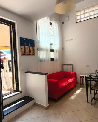 Openspace arredato, con posto auto
