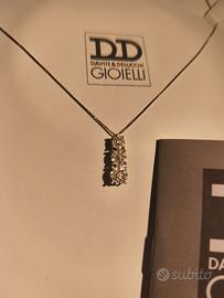 Trilogy diamanti oro bianco 18K Davite e Delucchi