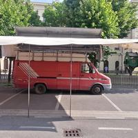 Tenda per furgone mercati