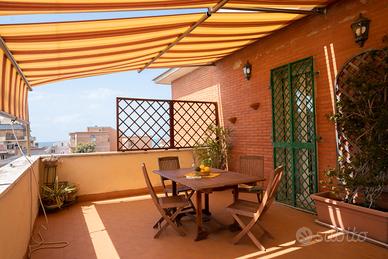 Attico con vista mare