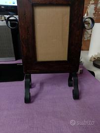 Cornice in legno con supporto in metallo