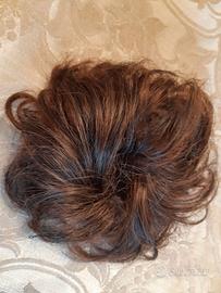 Due elastici con capelli