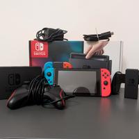 Nintendo Switch con 8 giochi e accessori vari