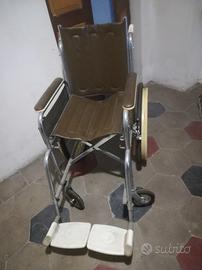 Carrozzina pieghevole
