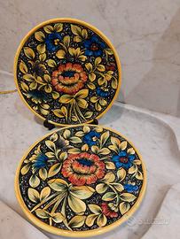 coppia di piatti da muro in ceramica 