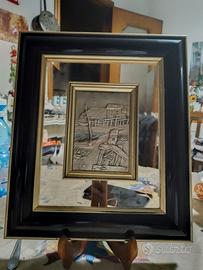 Quadro con bassorilievo centrale argentato firmato