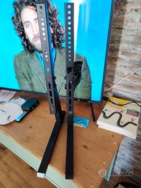 Due supporti per TV grandi da banco o parete