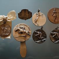 medaglie e spilla antiche