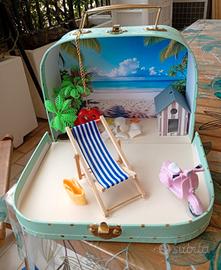 VALIGETTA CON DIORAMA MARE E SPIAGGIA TROPICALE.