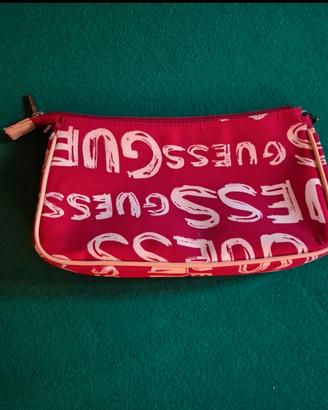 pochette Guess magenta con logo bianco
