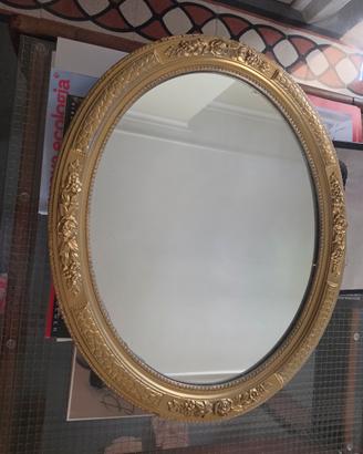 Specchio ovale legno dipinto oro.