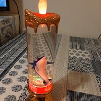 candela colorata luminosa con delfino 