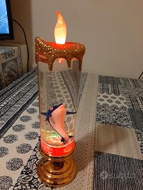 candela colorata luminosa con delfino 