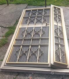 Porta con vetro con grata in ferro 104×191,5