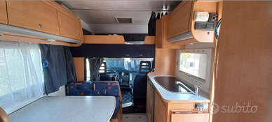 Camper Garage con e letti matrimoniali in coda