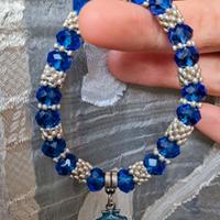 Bracciale blu con conchiglia