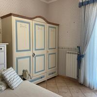 Camera da letto singola stile shabby chic elegante