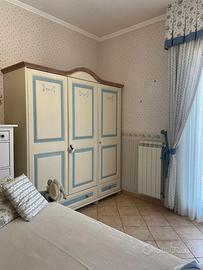 Camera da letto singola stile shabby chic elegante