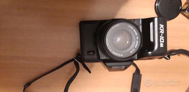 fotocamera ricoh con teleobiettivi