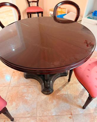 Tavolo rotondo in legno allungabile con sedie