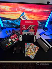 Nintendo switch oled + 2 giochi Mario Bros