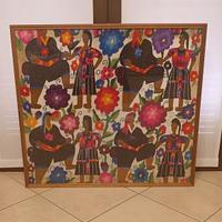 Quadro con batik; vetro e cornice in legno.