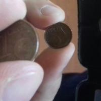 Moneta di 1 centesimo con uguale facciata
