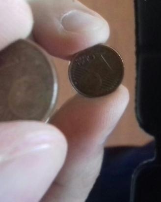 Moneta di 1 centesimo con uguale facciata
