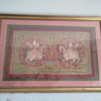 Arazzo con cornice dorata