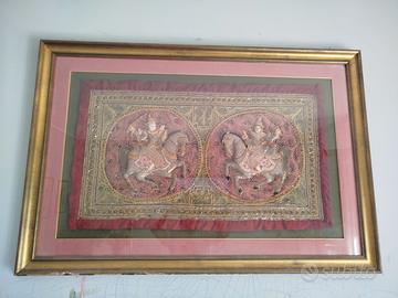 Arazzo con cornice dorata