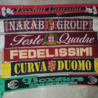 blocchi di sciarpe e adesivi ultras