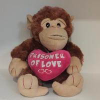 Peluche a forma di scimpanzé