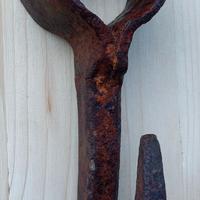 Antico gancio da macellaio in ferro battuto