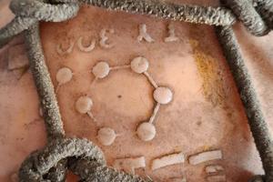 antica boa con legature in corda