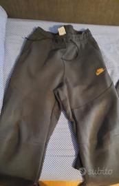 pantaloni tech nera e oro 