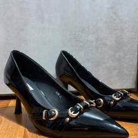 Décolleté nero lucido