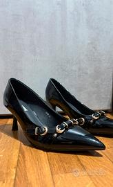 Décolleté nero lucido