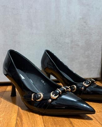 Décolleté nero lucido